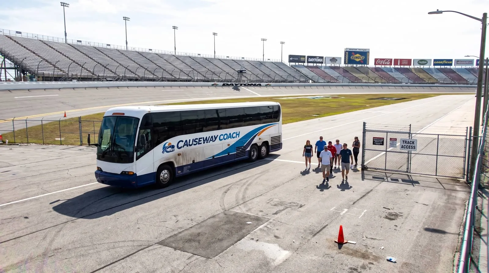 Causeway Coach motorcoach transporting a group toward Daytona International Speedway