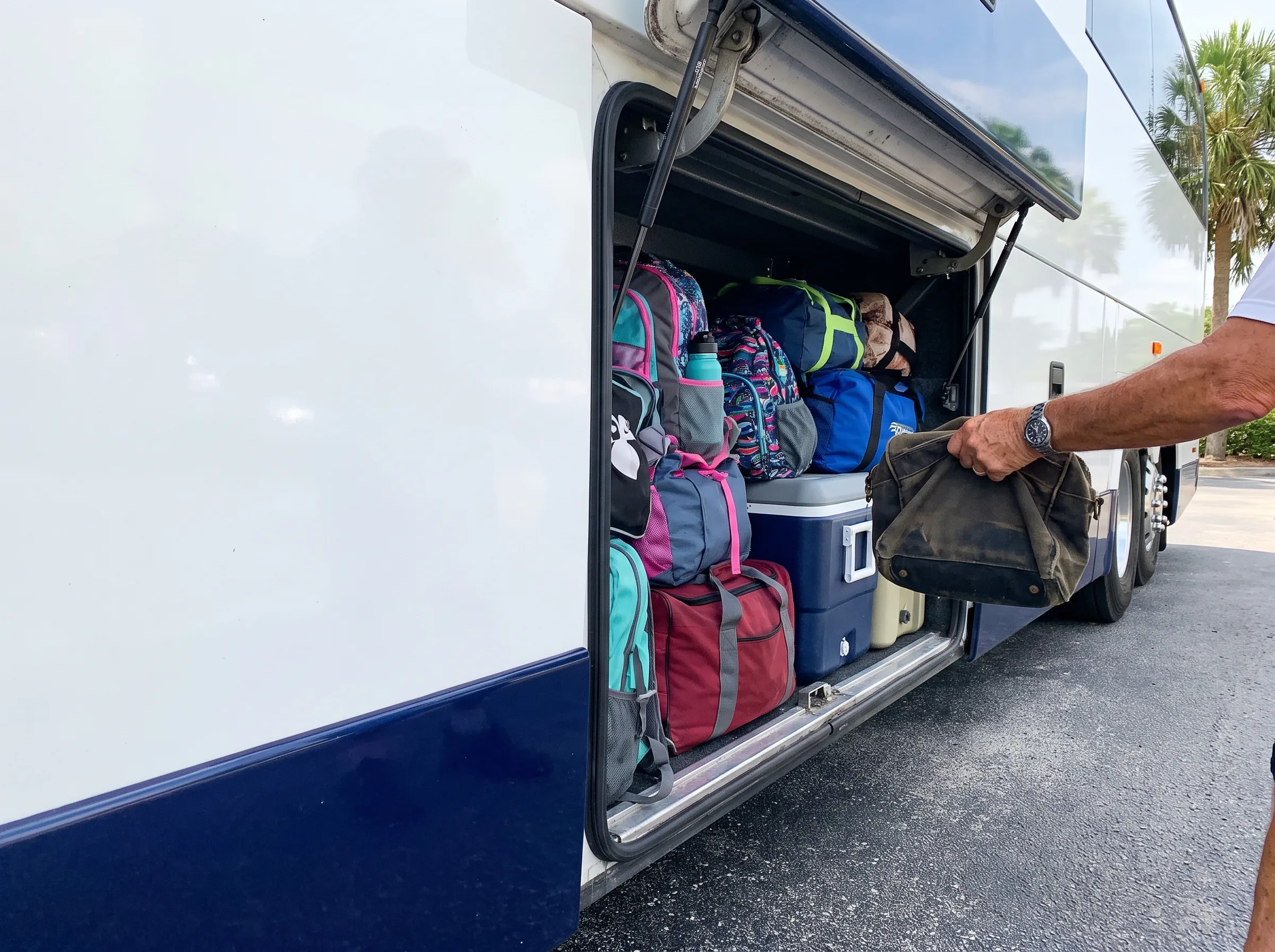 Luggage loaded into a motorcoach bay