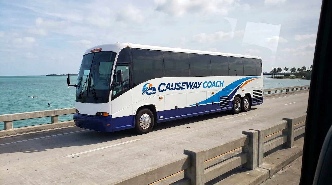 Causeway Coach charter bus crossing a Florida causeway on a clear morning