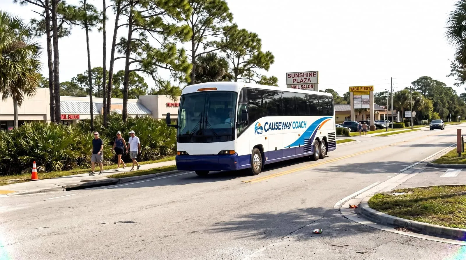 Causeway Coach motorcoach at an arena entrance in Estero near Bonita Springs, Florida