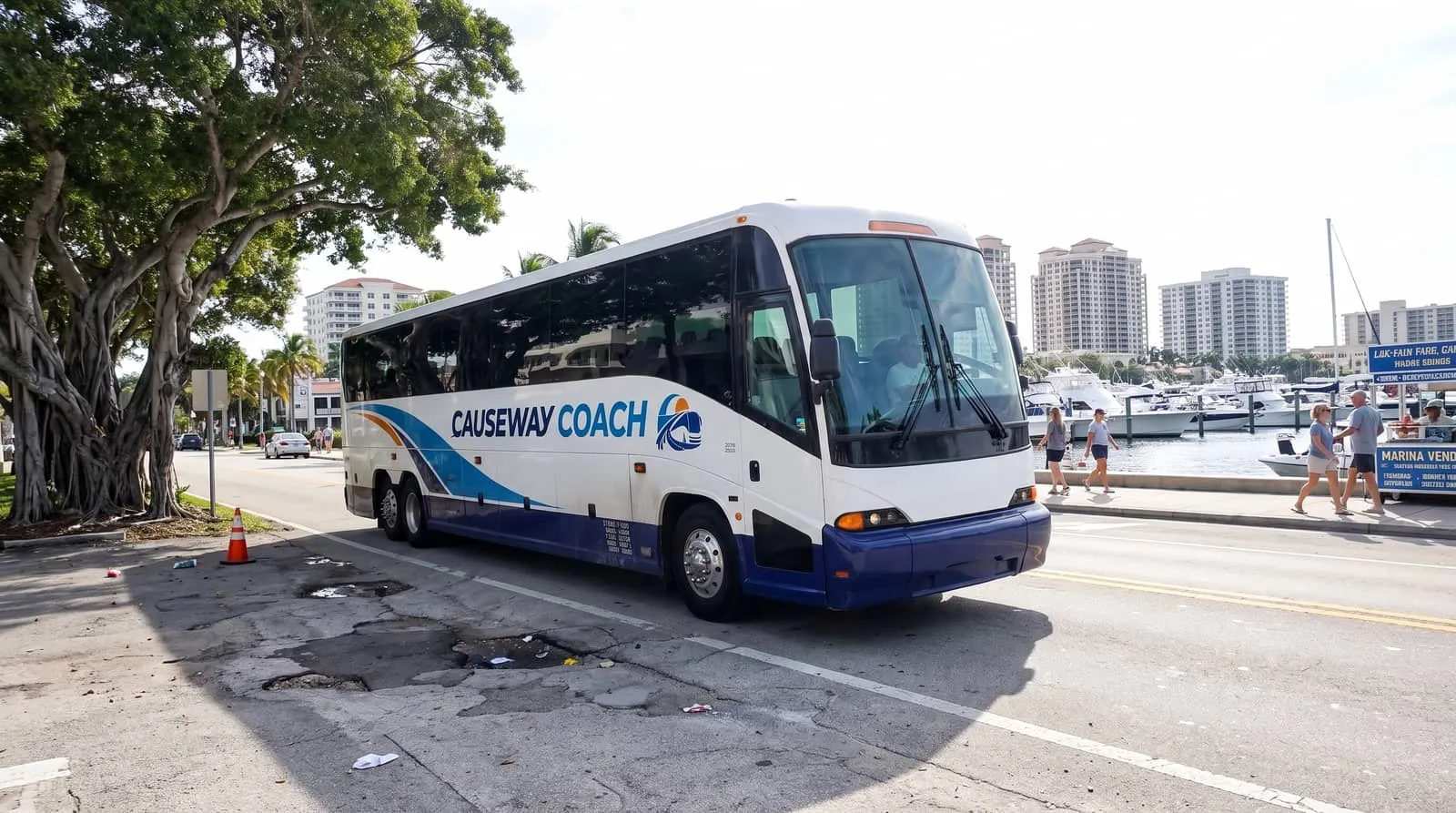 Causeway Coach motorcoach crossing a Palm Beach County bridge on a winter season morning