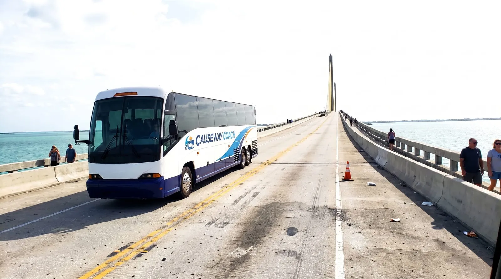 Causeway Coach motorcoach crossing the Sunshine Skyway toward Port Tampa Bay