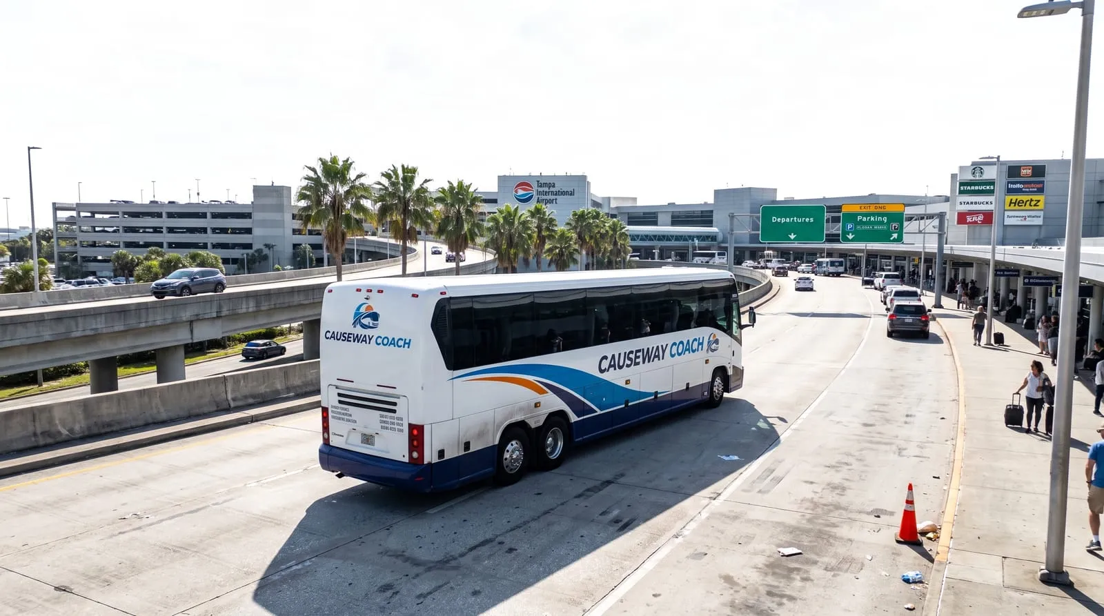 Causeway Coach mid-size coach collecting a group at Tampa International Airport for Sarasota